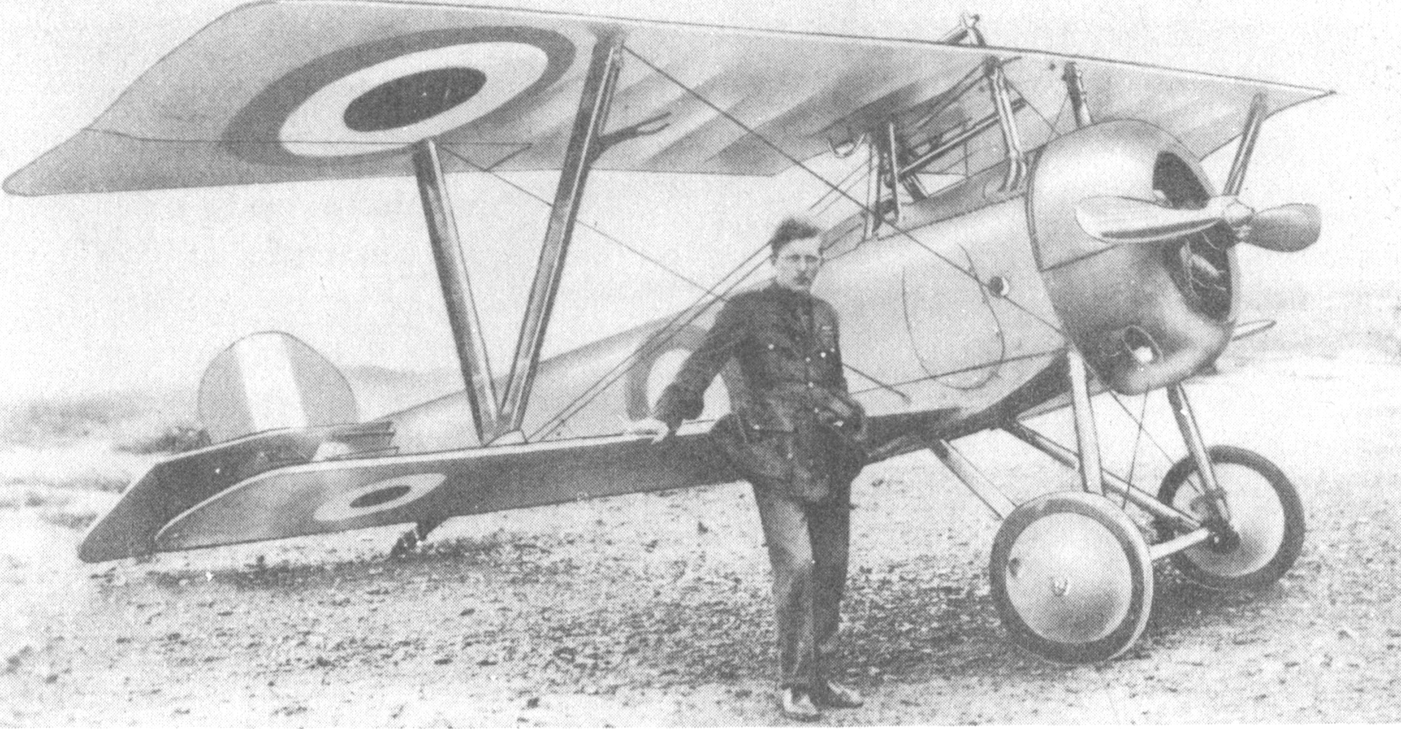 Billy Bishop leaning against his Nieuport biplane in 1916.