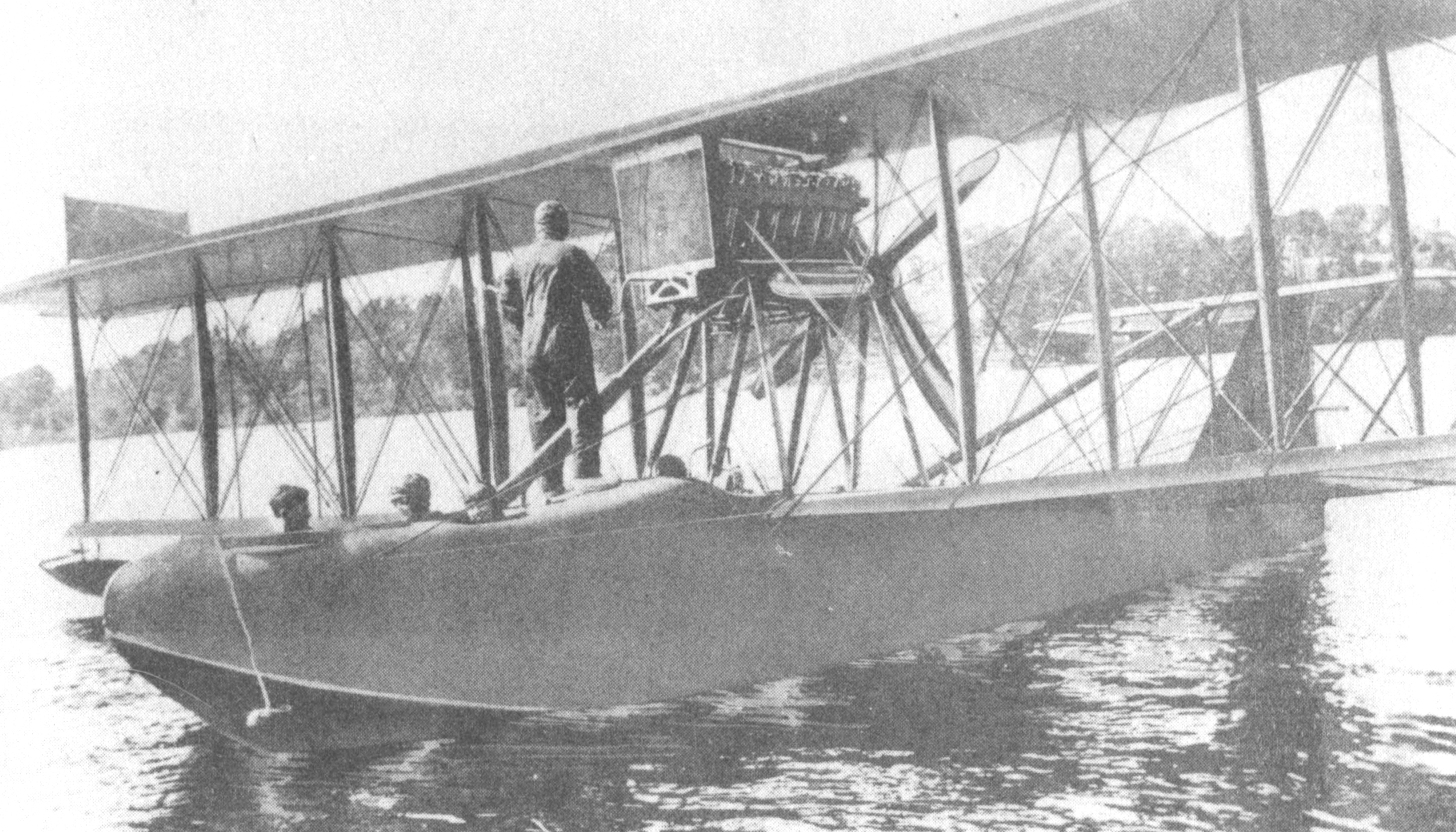 Bishop Barker Aeroplanes founded an early commercial airline. Here is shown an HS2L biplane parked in a lake readying to takeoff.