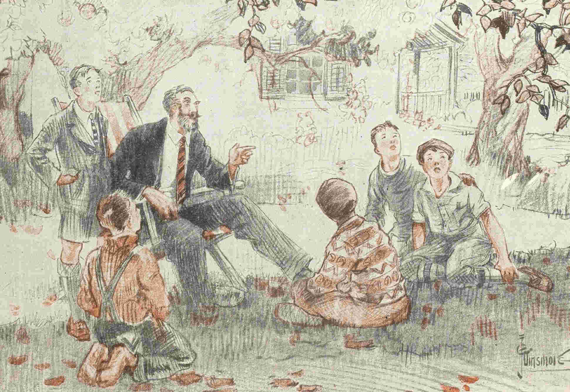 five boys sit under tree while man in suit on chair talks to them.