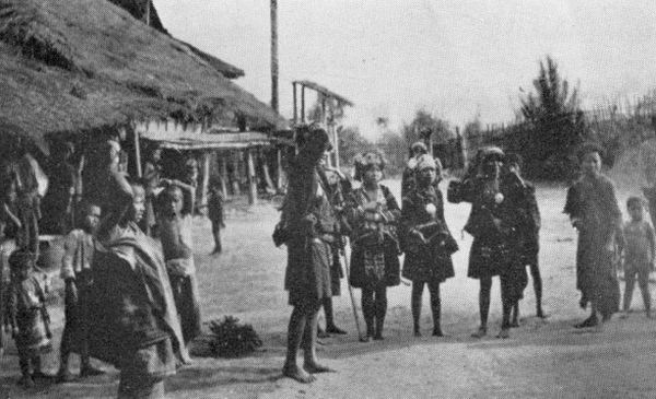 Akha women in traditional dress posing in village