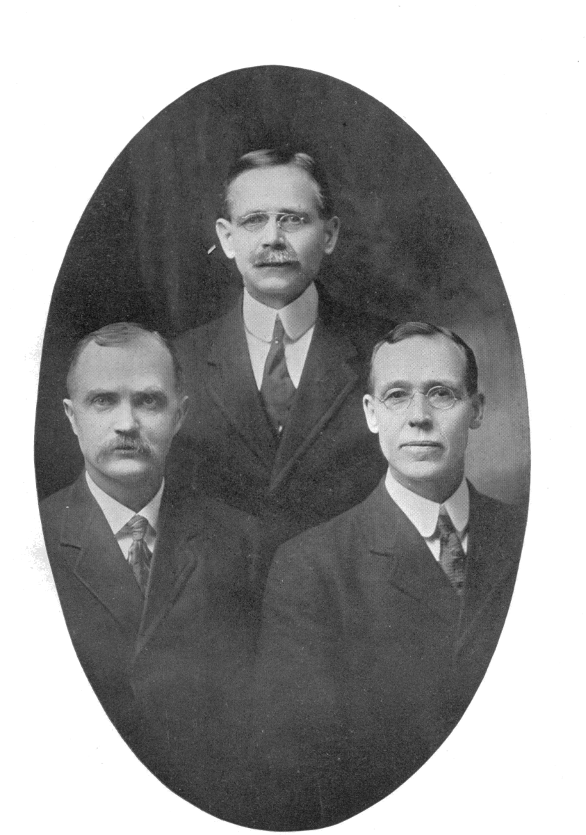 Three men standing