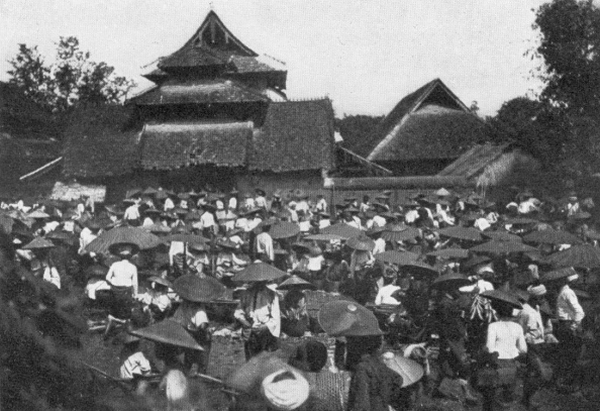 Public square in front of temple crowded with people